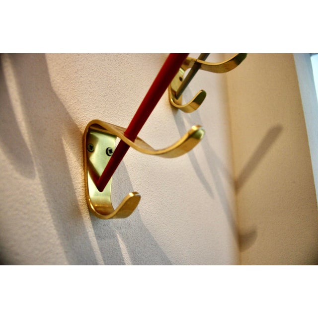 Very rare Austrian brass coat rack, 1950 This piece is attributed to the mentioned designer/maker. It has no attribution...