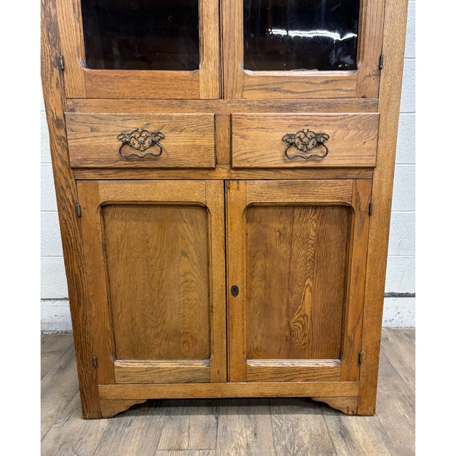This is a beautiful and rustic antique Victorian Early American pie safe or kitchen cupboard, cabinet, or pantry, believed...