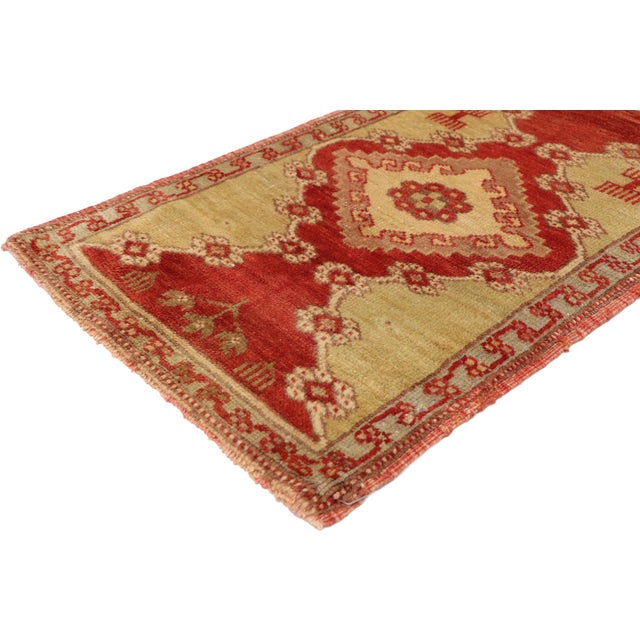 51184 Vintage Turkish Yastik Rug, 01'08 x 02'06. This enchanting hand-knotted wool vintage Turkish Yastik rug showcases a...