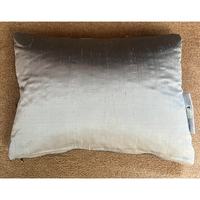 This lovely pillow was created with silk ribbon that was hand-stitched to the ground fabric. Zipper closure, with a subtle...