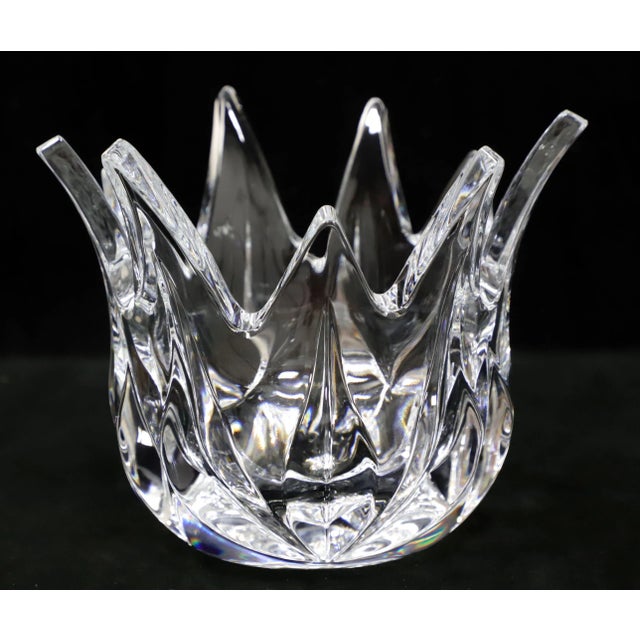 A Late 20th Century decorative crystal bowl. Clear crystal round bowl with flared out points at top that alternate in size...