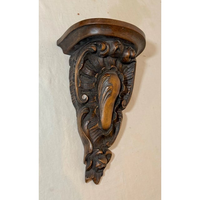 This lovely antique wall mount shelf is a beautiful addition to any home decor. Handmade with intricate carvings, the...