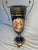 Late 1800’s early 1900’s, French, Sevres style cobalt blue painted urn vase with metal accent handles and base.