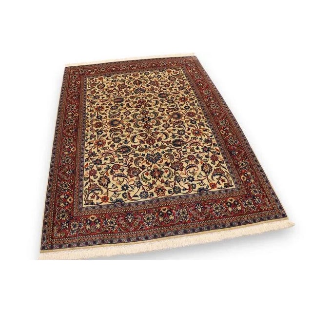 Traditional Middle Eastern Sarouk rug | Knot density: 400.000 knots/m² | Pattern: Colorful leaf and floral motifs | Size:...