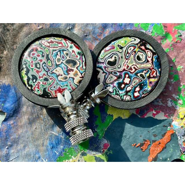 Pair of lamp finials crafted from gem polished graffiti paint, reclaimed from public areas which have been repeatedly...