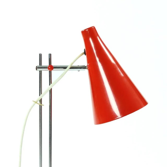 This table lamp was designed by Josef Hurka for Lidokov in Czechoslovakia. Made of red lacquered metal, it features simple...
