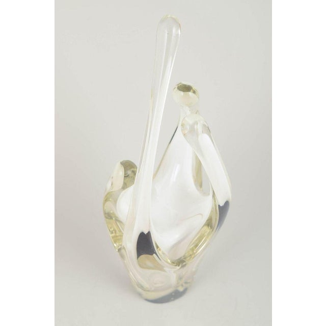 Paul Kedelv for Flygfors “Coquille”, 1955. Organic, sculptural art-glass vase in clear glass with an inner white core,...