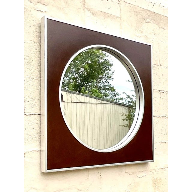 Fantastic vintage Contemporary wall mirror. Beautiful wood frame with a circle in the square design. Brushed chrome frame....
