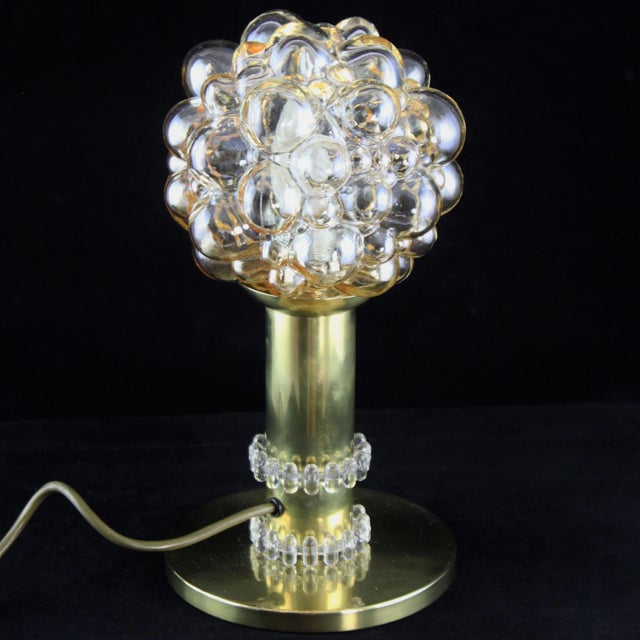 The beautiful and rare lamp is a true design classic from the 60s. This light in unusual design is a highlight for every...