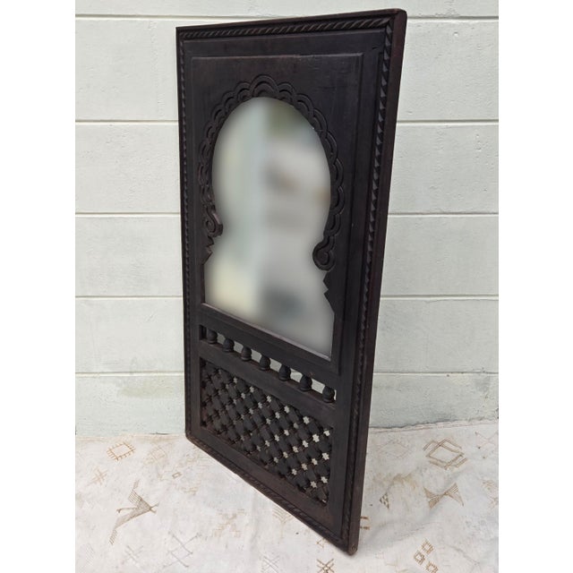 Vintage!! What a stunning hand carved wooden mirror measuring approximately 38" in height and 21" in width. Old age...