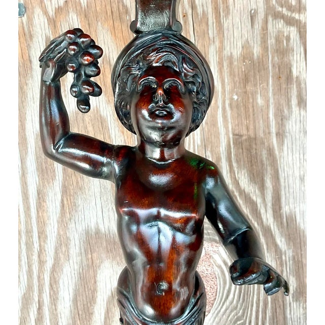 A spectacular vintage hand carved pedestal. Incredible detail on this composition of half cherub, half serpent. Sure to...