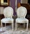 Charming pair of French white chairs with a beautiful Rose Tarlow print upholstery. There are no tags or markings.