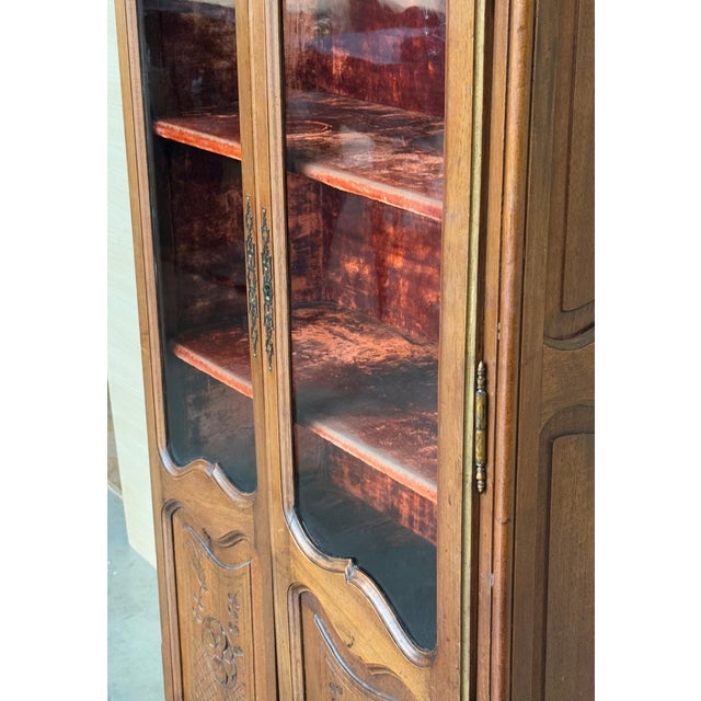 19th century Country French Walnut Vitrine will make a stunning display case for your most prized possessions! Crafted in...
