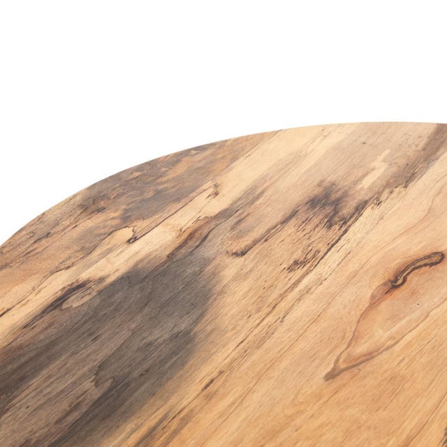 Stunning forces of nature are captured in a coffee table, as spalted primavera wood is hand-shaped into a cylindrical...