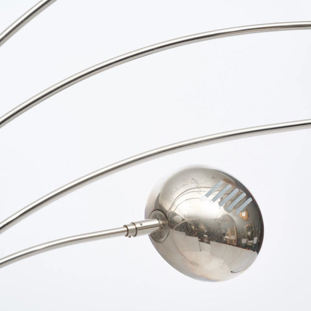 Floor lamp designed by Christian Koban and made by German company DOM. This piece is supported by a Carrara marble spheric...