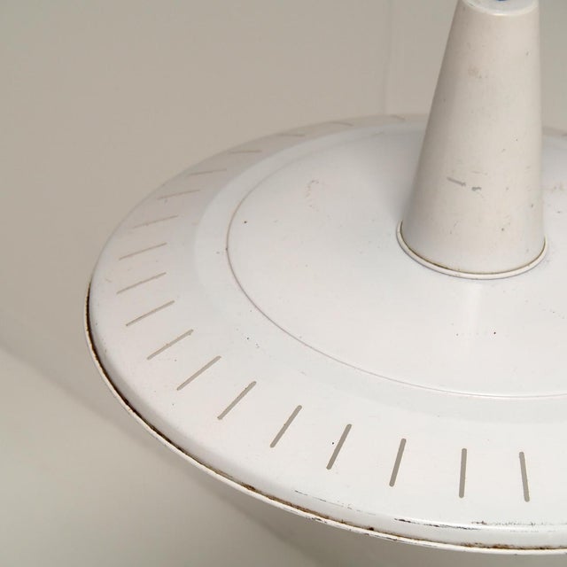 This original Belgian industrial pendant lamp dates from the 1950s and were salvaged from a former primary school in...