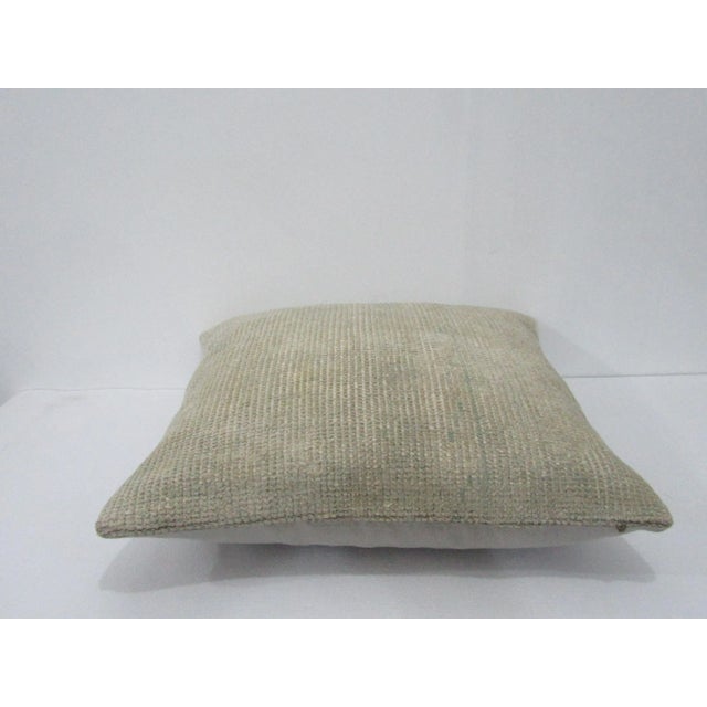Decorative pillow cover made from a vintage Turkish handknotted rug. Backed with good quality cotton fabric. Pillow...