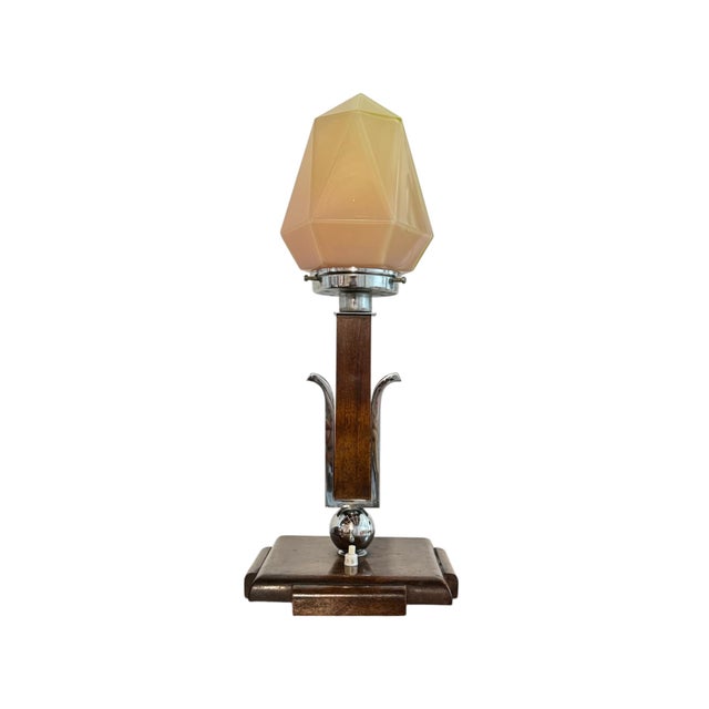 Very rare Art Deco table lamp, Central Europe, 1920s. Crafted from solid walnut, it features a stepped base and column...