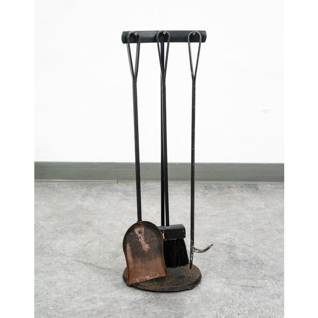 Stylish Mid-Century Modern fireplace set of wrought iron fireplace tools. Includes a stand, three fireplace tools (shovel,...