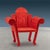 Armchair designed and created by Anacleto Spazzapan by welding an iron rod and then embellishing it with red fabric...