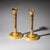 A pair of elegant Empire candlesticks crafted from partially fire-gilded bronze, dating to the early 19th century. Each...