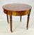 A very fine pair of solid cherry drum tables from Henredon's Registry Collection. These tables feature solid cherry...