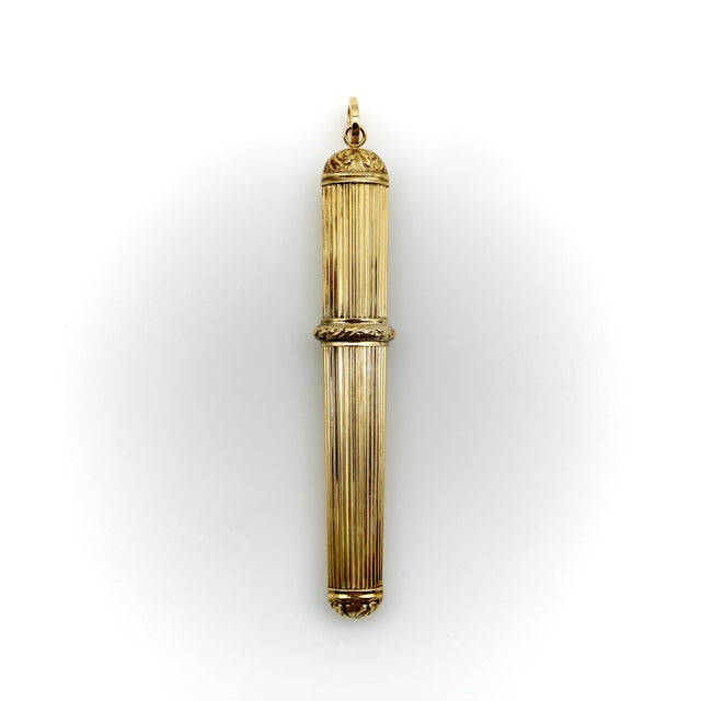 This elegant 14k gold reeded needle case was an everyday object in the life of a Victorian woman. The case is capped with...