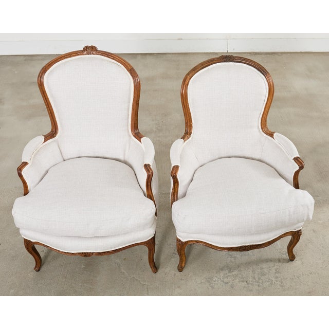 Pair of French Louis XV Style Walnut Bergeres With Linen For Sale - Image 4 of 18