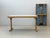 This high-quality folding table from hiller impresses with its durable, functional construction and timeless design. The...