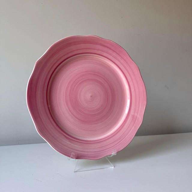 Franciscan pink scalloped edge ceramic charger plate.