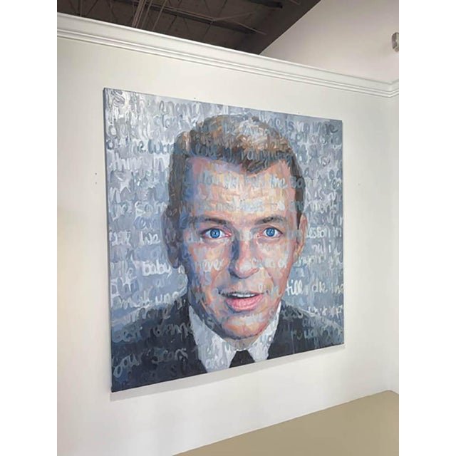 Quotes within painting: "If you don't know a guy on the other side of the world, love him anyway because he is just like...