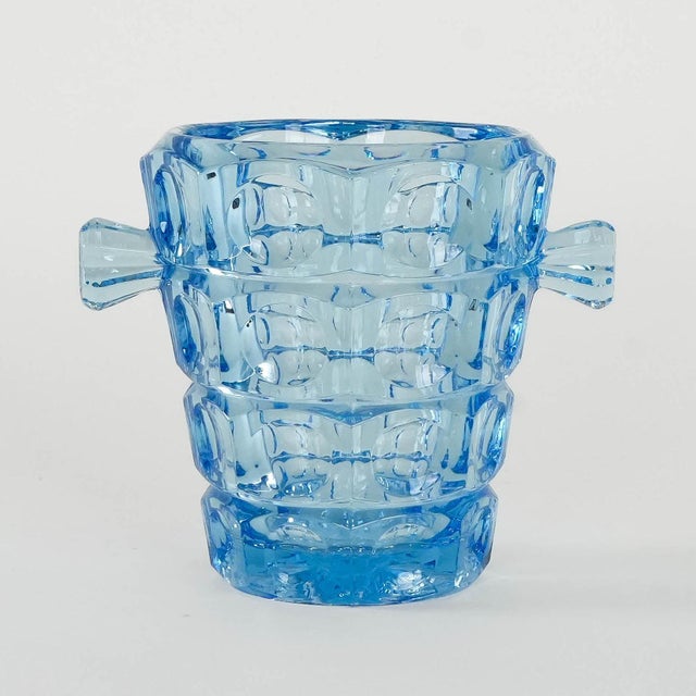 The Rosice ice bucket was manufactured in the 1950s by the Czech manufacturer Sklo Union. Designed by Rudolf Jurnikl. An...