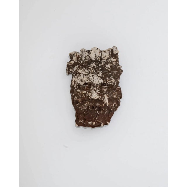 Made out of concrete, this decoration from 20th-century Italy takes influences from Gothic architecture. With its face...