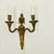 Dimensions: 15 ¼” H x 10 ½” W x 5 ½” D A dramatic pair of gilt bronze wall sconces, hand-crafted in France in the 19th...
