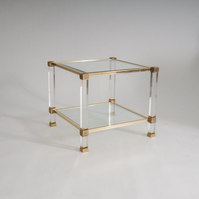 Add a touch of Parisian high-glamour to your living space with this iconic square side table by the renowned Pierre...