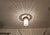 Art Deco ceiling lamp, circa 1920. Curved brass ring. Replaced glass rods. The lamp has been completely overhauled. Brass...
