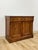 This antique French buffet showcases a genuine gray marble top set above rich burlwood door and drawer fronts, offering...