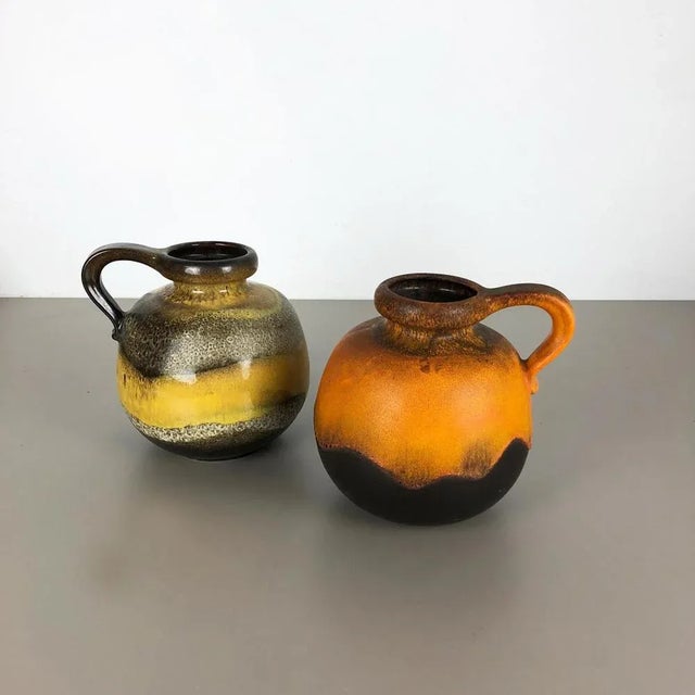 Set of two fat lava art vases model: 484-21 Producer: Scheurich, Germany Decade: 1970s Description: These original vintage...