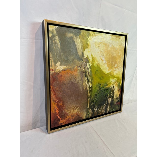 Framed Giclee on Canvas Featuring a Colorful Abstract Design.