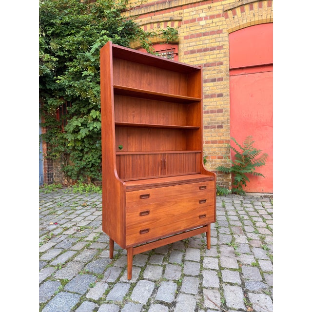 A piece of Danish design history with a unique provenance: This stylish bookcase with an integrated secretary desk,...