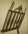 Hand forged metal antique music stand featuring an ornamental rack and tri-foot base. In a way it is primitive but there...