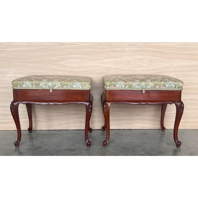 Pair of 20th century Spanish walnut Footstools standing on cabriole legs with richly foliate carvings and folding seat...