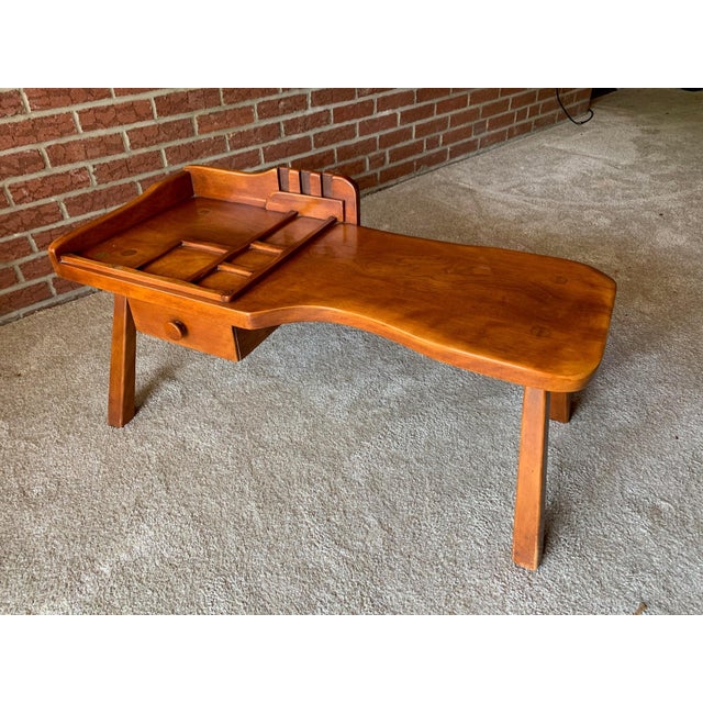 Cobbler's Table circa 1940 for Cushman Colonial Creation, carved maple, stamped 'CUSHMAN 5 16', height 18in (46cm); width...