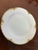 Antique Haviland Limoges of France elegant white plates with gold trim. Set has 6 plates and 6 vintage Brass LB Depose...