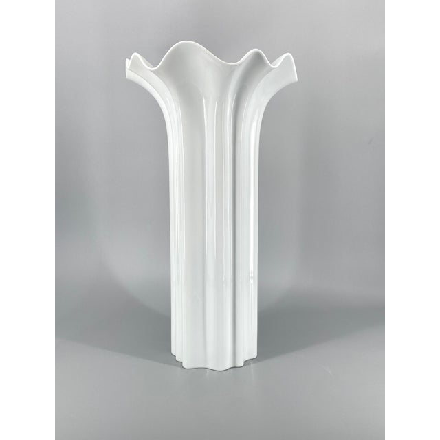 A vase * A floor vase * by Hutschenreuther * from the "Tavola Argos" series * organic shape * porcelain * with white base...