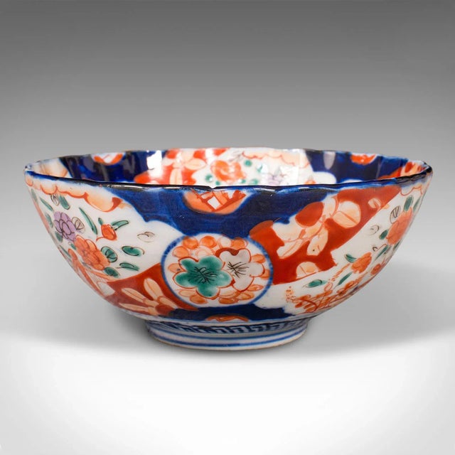 This is a small antique Imari bowl. A Japanese, ceramic decorative dish, dating to the late Victorian period, circa 1900....