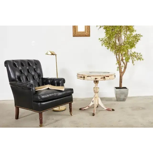 Charming 19th century country Swedish center table or rent table finished in the Gustavian taste. The round drum form...