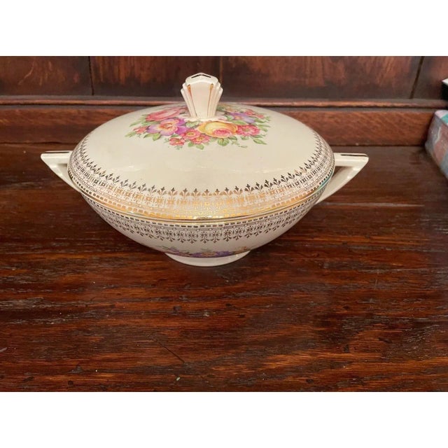 Offered is a lovely vintage covered bowl by The Edwin M Knowles China Co. This set features a floral design with 22 karat...