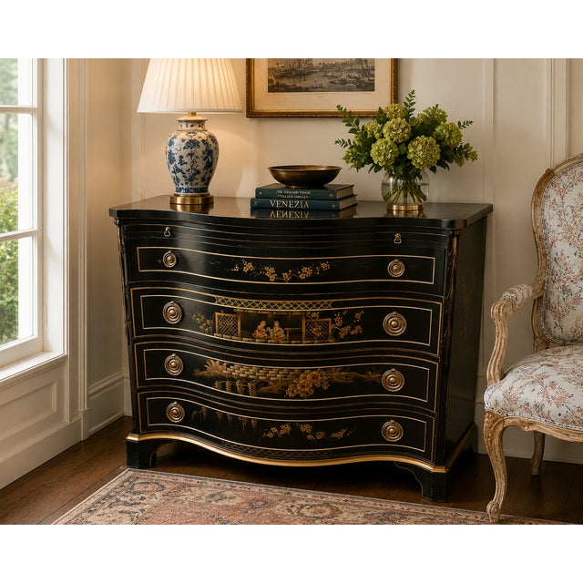 A striking vintage chinoiserie chest by Union National, showcasing a beautifully sculpted serpentine silhouette and richly...