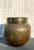 Elevate your home decor with this stunning vintage hammered brass urn, a timeless piece that exudes elegance and...